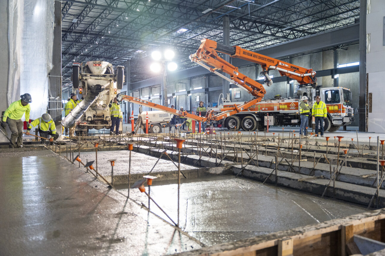 Concrete work takes place on an interior commercial structure. (PHOTO: ADLER INDUSTRIAL)