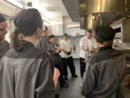 An instructor demonstrates a technique for students at Life's Kitchen. (PHOTO: LIFE'S KITCHEN)