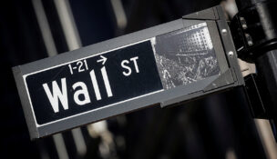 A street sign for Wall Street is seen in the financial district in New York on Nov. 8, 2021. (PHOTO: REUTERS/Brendan McDermid, file photo)