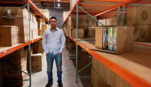 CEO Jason Cheung of toy manufacturer Huntar Company Inc poses amongst partially empty shelves at the U.S. office in Union City, California, on May 8, 2025. (PHOTO: REUTERS/Brittany Hosea-Small/File Photo)