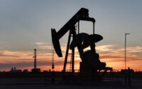 A drone view of a pump jack and drilling rig south of Midland, Texas, on June 11, 2025. (PHOTO: REUTERS/Eli Hartman/File)
