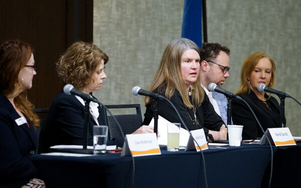 Wendi Secrist, executive director of Idaho Workforce Development Council, center, talks about Idaho LAUNCH and the success of that program. (PHOTO: MARC LUTZ, IBR)