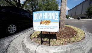 A Cracker Barrel restaurant displays a "Now Hiring" sign in Tampa, Florida, on June 1, 2021. (PHOTO: REUTERS/Octavio Jones/File)