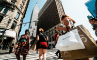 A woman carries shopping bags in Manhattan in New York City, on Aug. 11, 2025. (PHOTO: REUTERS/Eduardo Munoz/File)