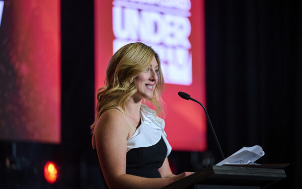Ally Daniels, director of the Online and Professional MBA programs at Boise State University College of Business and Economics, speaks at the annual event as a representative of one of the two presenting sponsors. (PHOTO: PRO IMAGE EVENT PHOTOGRAPHY)