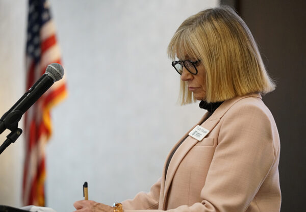 Trudy Hanson Fouser, partner at Hawley Troxell, the presenting sponsor of the event, moderated the panel discussion. (PHOTO: MARC LUTZ, IBR)