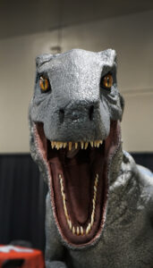 "Blue" the velociraptor made an appearance at the con for selfies with attendees, but was well-behaved, choosing not to eat anyone stopping for a selfie. (PHOTO: MARC LUTZ, IBR)