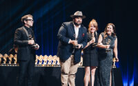 Left to right: Mark Fisher of Fisher Creative, and Andre Womack, Nataile Jushinski, and Andrea Rayburn of Visit Idaho accept a Northwest Regional Emmy for the documentary series “The 3100.” (PHOTO: Vivian Hsu Photography/NATAS Northwest Regional Emmys)