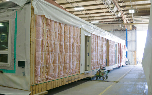 Though this unit built by Guerdon's crews looks long and narrow, it will be combined with others to create a complete dwelling space. (PHOTO: MARC LUTZ, IBR)