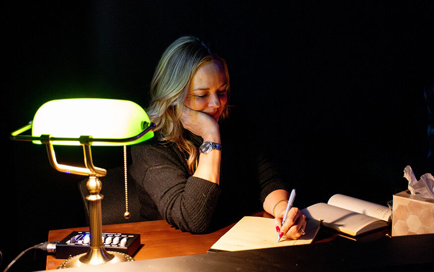 April Grady, owner of Boise Acting Studio, takes notes while clients perform a scene at the black box theater in downtown Boise. (PHOTO: KEARNEY THOMPSON)